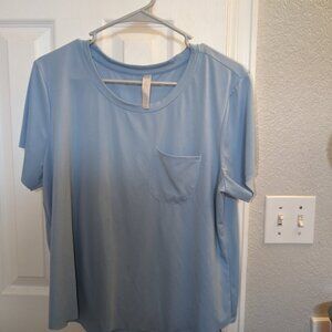 RBX Large blue activewear top with pocket
